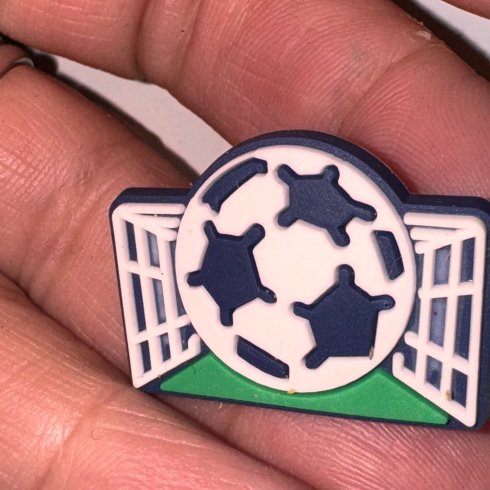 Soccer ball off brand crocs shoe charm. Brand new. Bundke to save 3 for 10